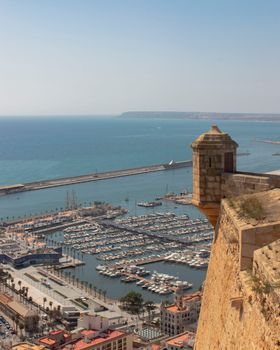 Stunning view of Alicante marina from Santa Barbara Castle with the Mediterranean Sea in the background.