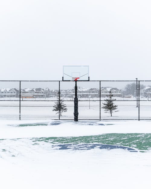 Basketball Field Covered with Snow 