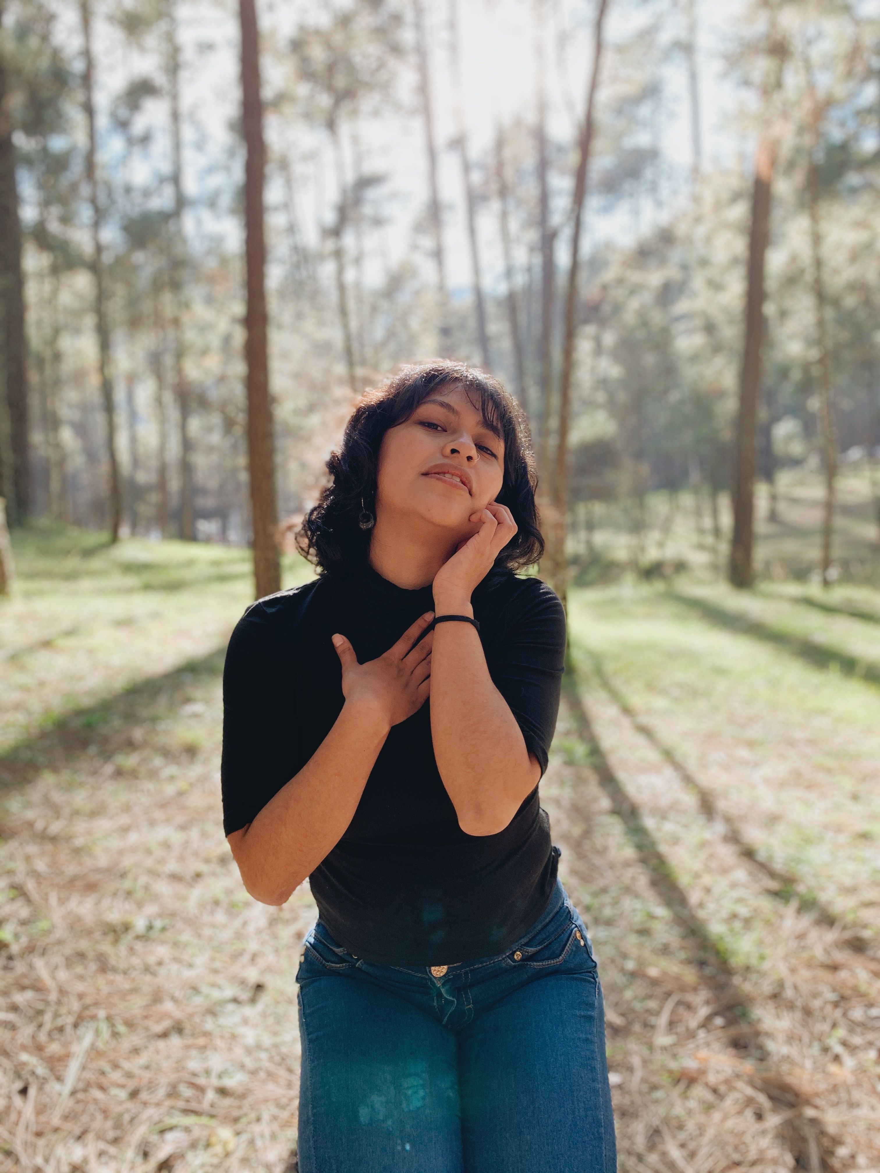 A Woman Posing in a Forest · Free Stock Photo