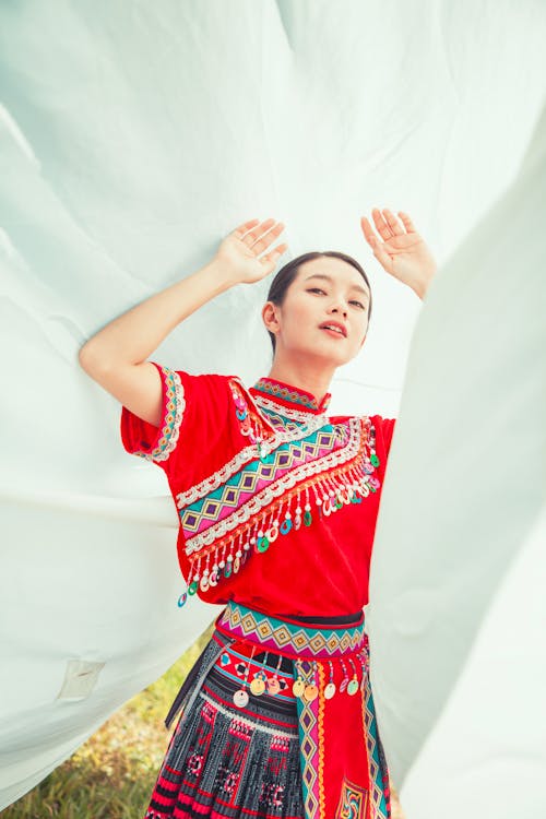 Model Posing in Folklore Blouse and Skirt
