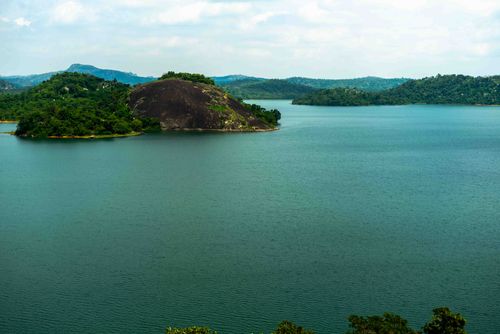 Free Breathtaking view of a lush island and calm waters in Abuja, perfect for relaxation and nature lovers. Stock Photo