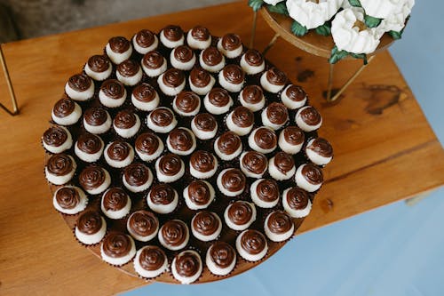 A tray of cupcakes on a wooden table