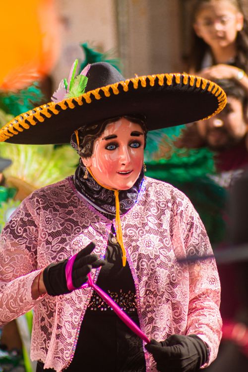 Free Colorful carnival scene with traditional costumes and mask in Mexico. Stock Photo