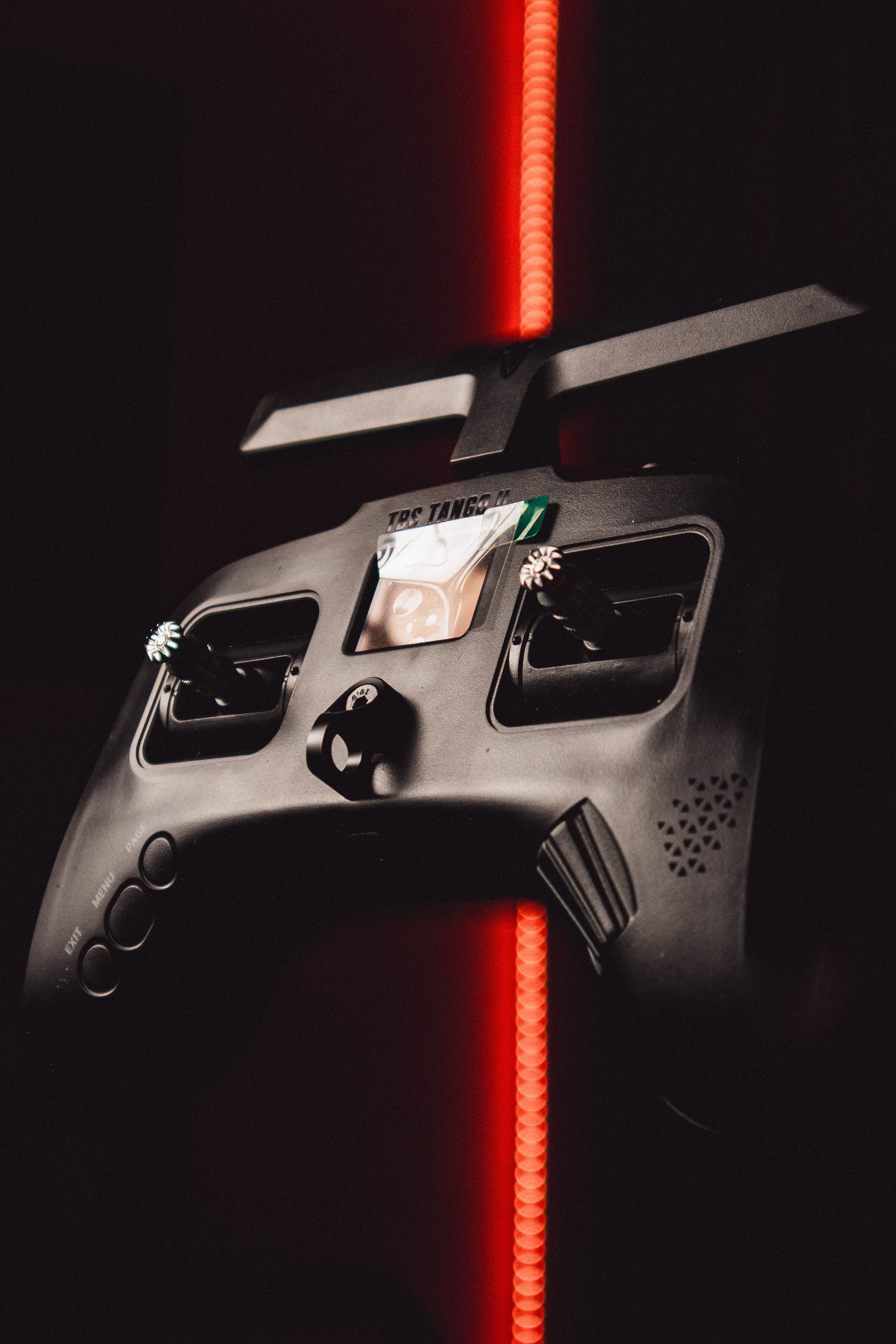 Controller on Black Background · Free Stock Photo