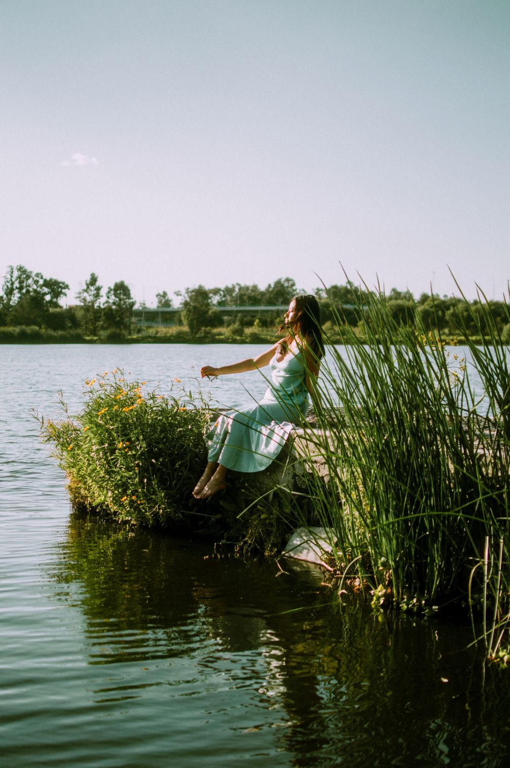 Woman Wearing Dress Sitting by the Lake · Free Stock Photo