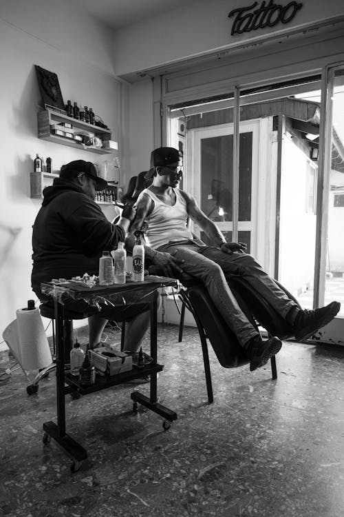 A Man Getting a Tattoo in a Tattoo Studio 