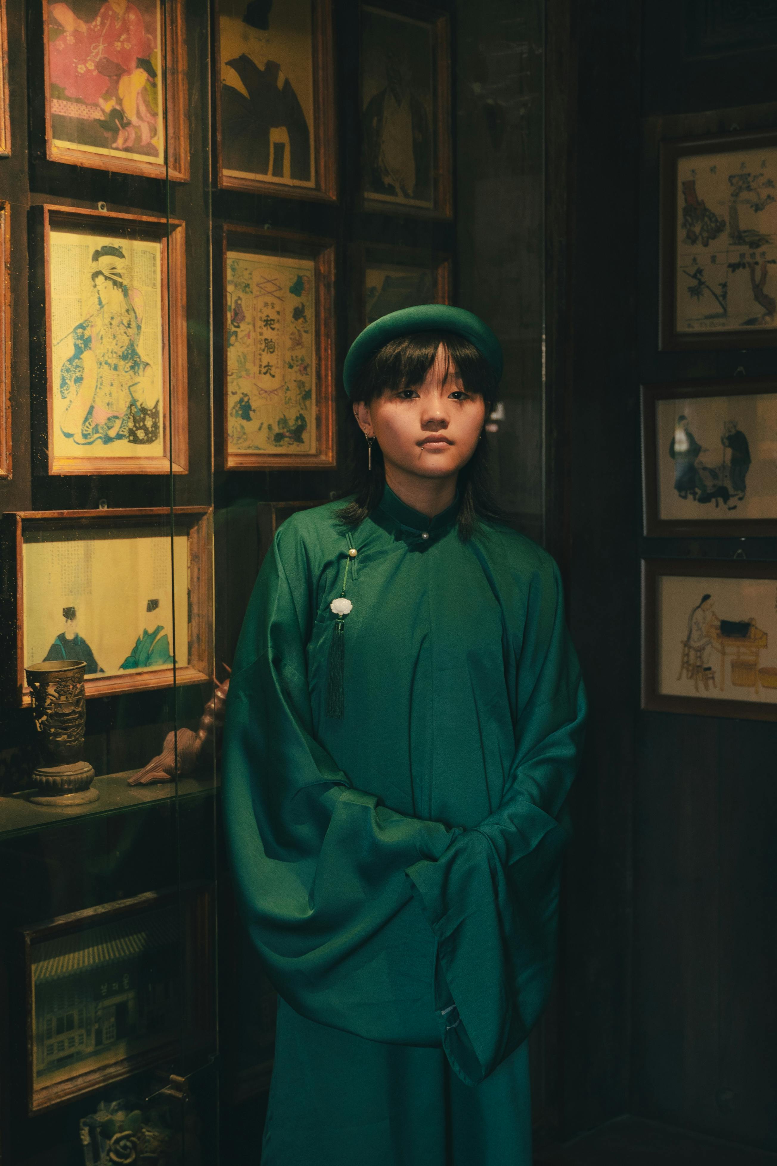 Pretty Brunette Wearing a Traditional Robe Standing in Front of a ...