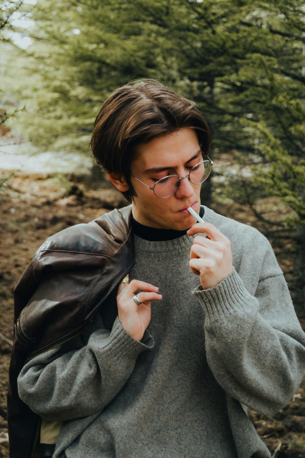 smoking (Photo by omer derinyar on pexels) man smoking