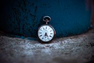 Close-up Photo of a Vintage Pocket Watch