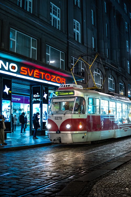 Vintage Tram on Street in Prague at Night