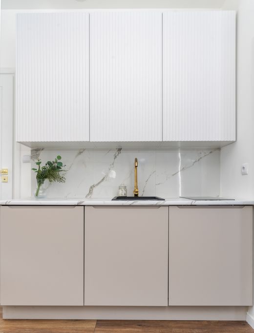 Minimalist marble kitchen — photo by Mateusz Pielech on Pexels