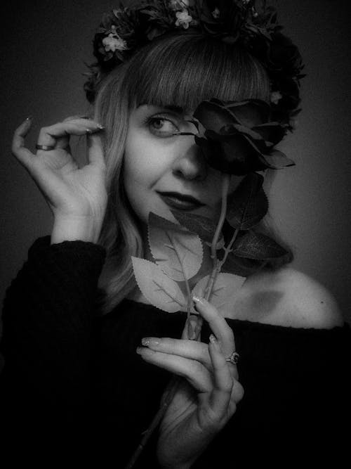 Portrait of Woman with Flower in Black and White