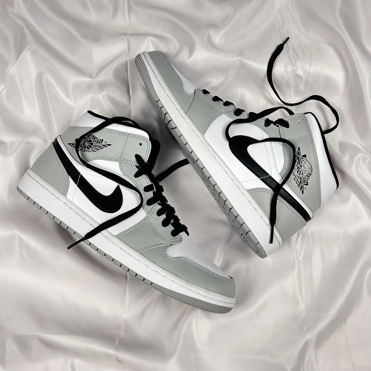 A Grayscale Photo of a Sneakers · Free Stock Photo