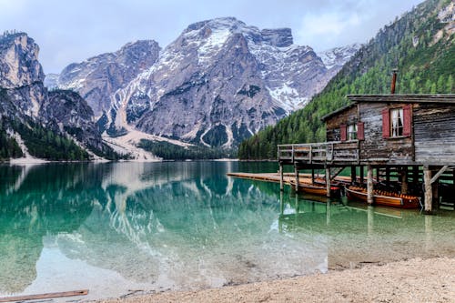 Scenic View of Pragser Wildsee and Dolomite Mountains in Italy 