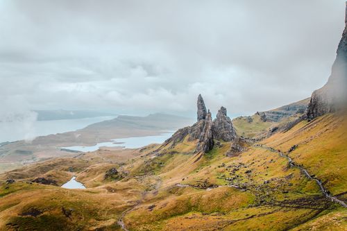 Free A breathtaking aerial shot of the iconic Old Man of Storr rock formation on the Isle of Skye, Scotland. Stock Photo