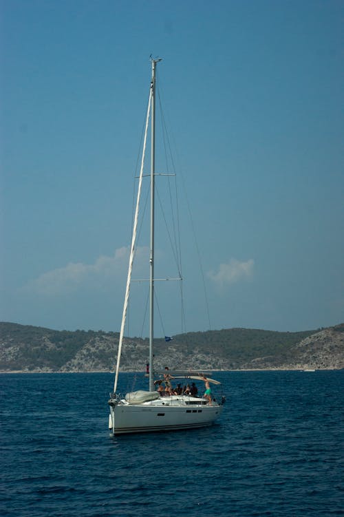 Free A sailboat in the water Stock Photo