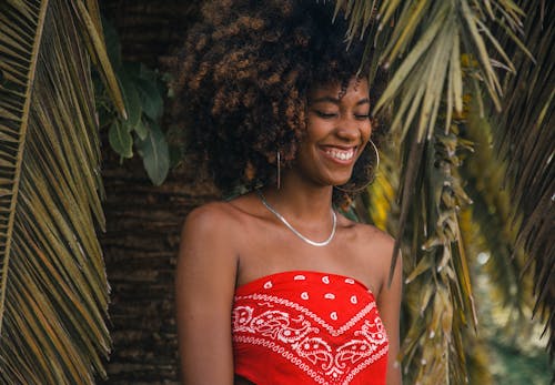 Woman Wearing Red and White Crop Top