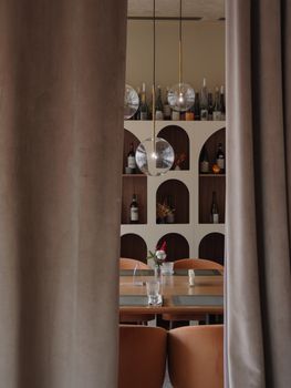 Stylish restaurant interior featuring modern furniture and contemporary design elements.