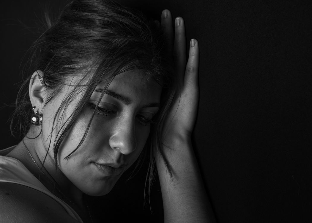 Woman Face and Hand in Black and White · Free Stock Photo