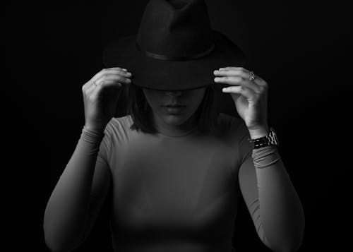 Portrait of Woman in Hat in Black and White