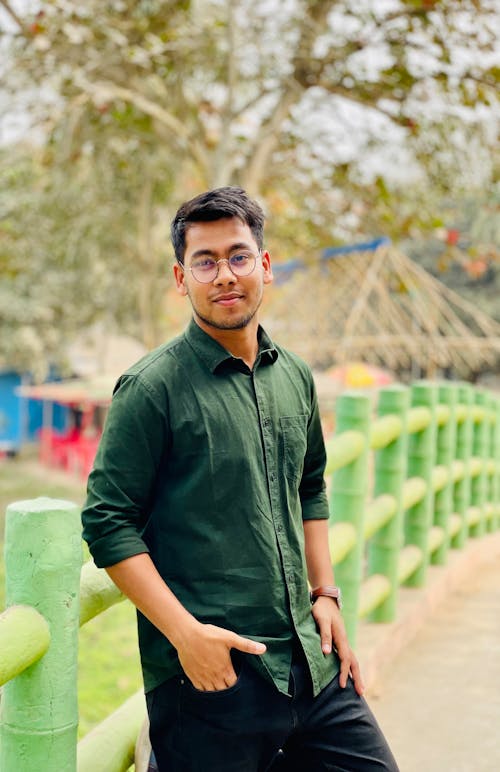 Portrait of Man in Green Shirt