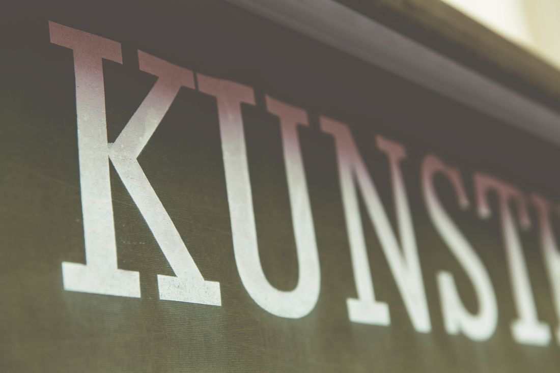 Close-up image of the word 'Kunst' in a stylish font on a dark backgro — Photo by Markus Spiske on Pexels