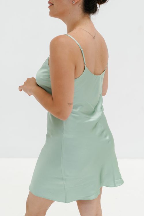 The back view of a woman in a green dress Free Stock Photo The back view of a woman in a green dress Free Stock Photo