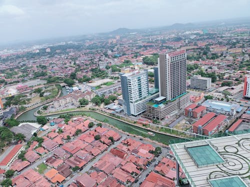 High rise view of building & houses