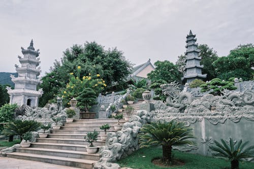 View of a Pagodas and Carved Details on the Walls in a Garden 