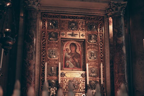 Close-up of a Religious Painting and Decorations in a Church 