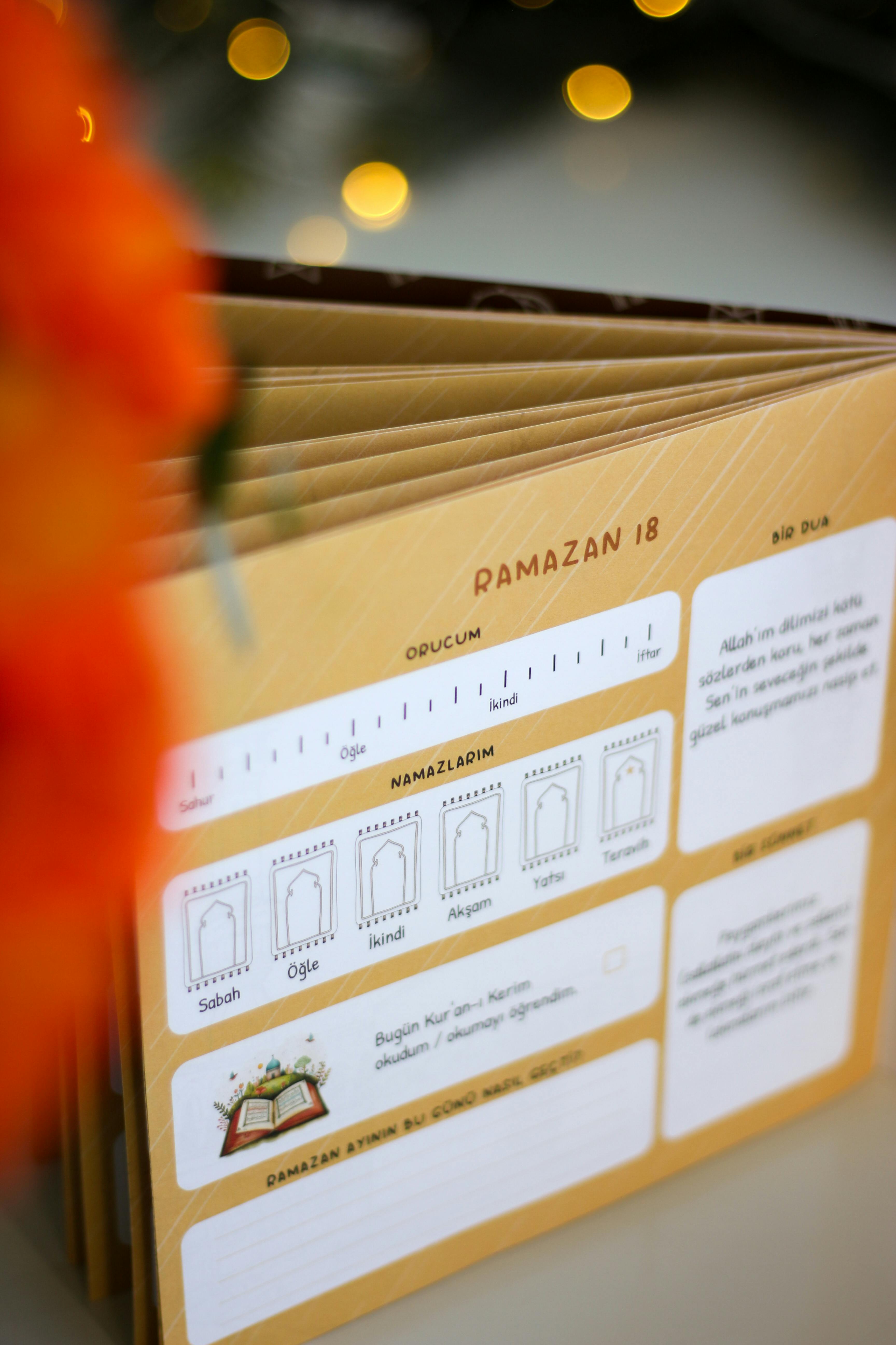 Open planner highlighting Ramazan schedule with warm lighting effects.