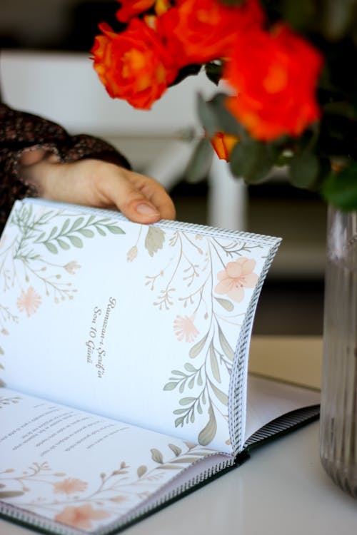 Close-up of a Woman Looking Through a Book 