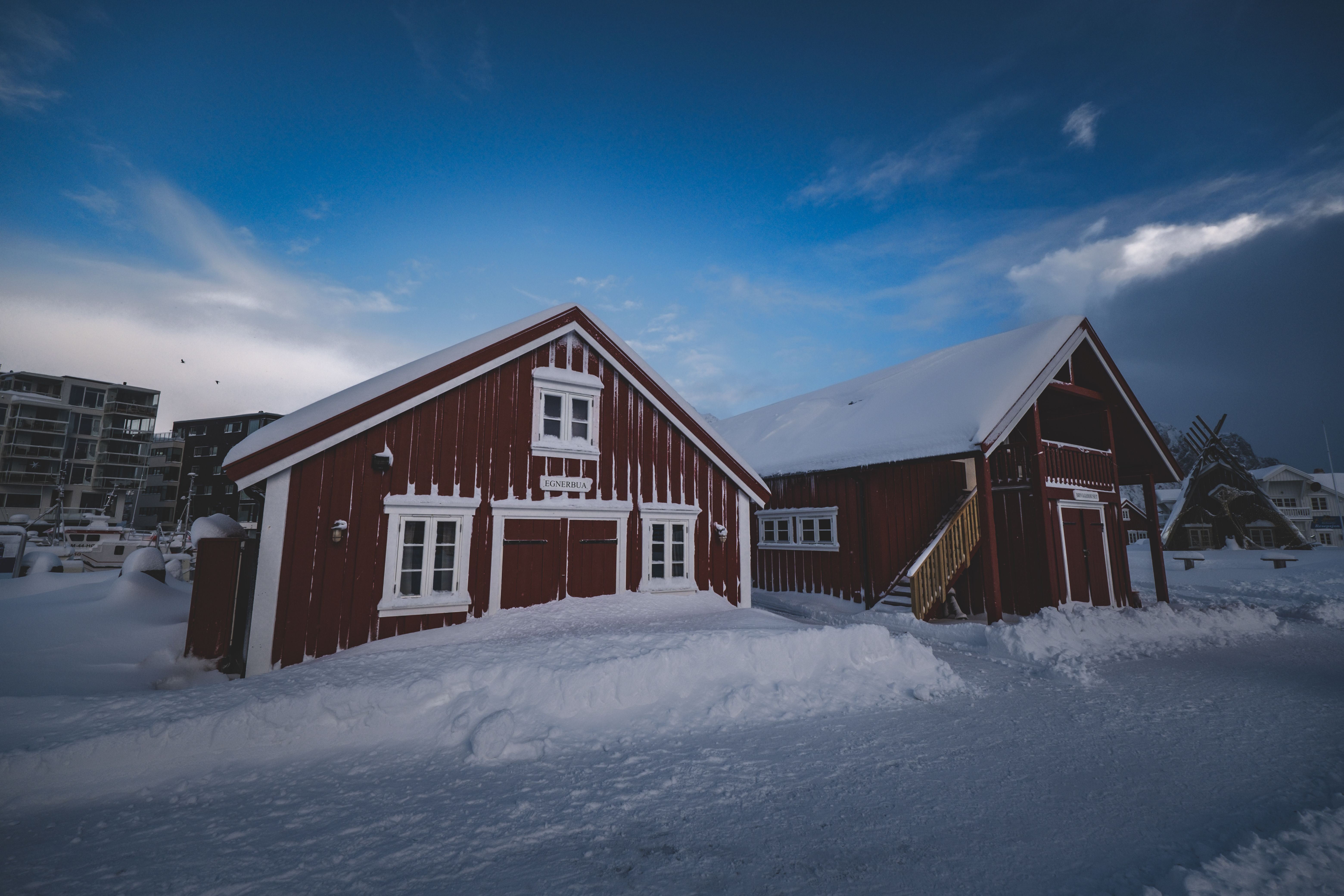 Wooden Buildings in Village in Winter · Free Stock Photo