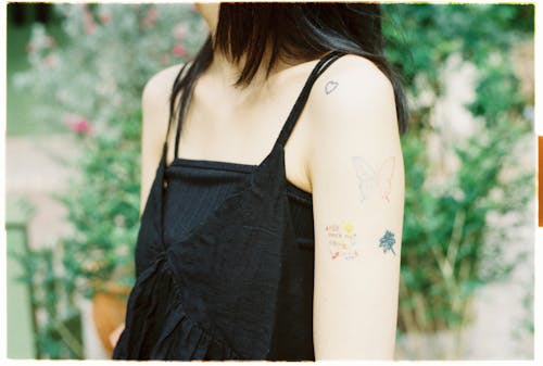 A woman with tattoos on her arm