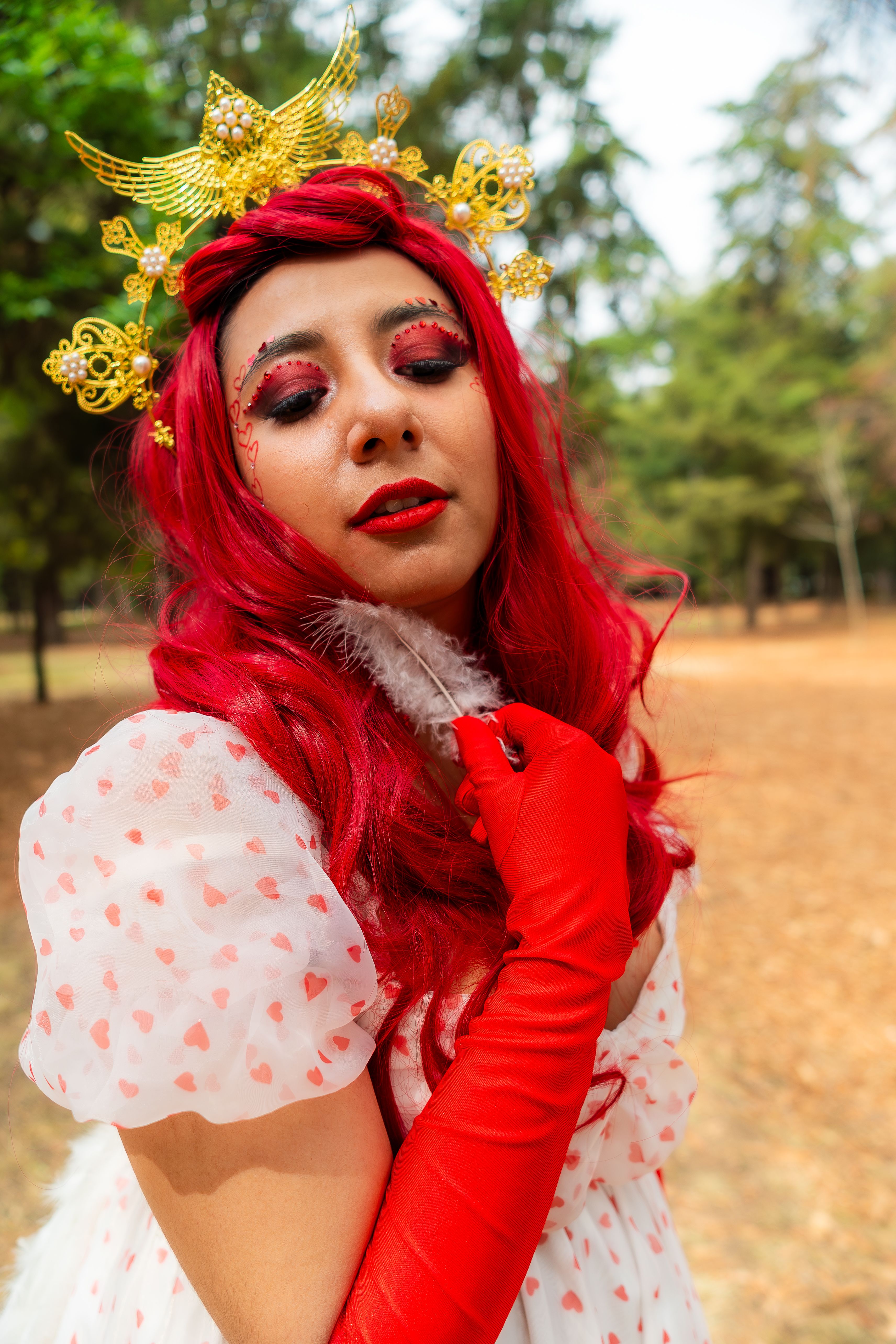 A woman with red hair and a crown on her head · Free Stock Photo