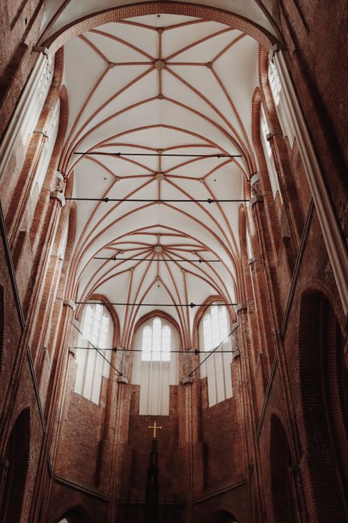 Free Explore the intricate Gothic architecture of a historic cathedral in Riga, capturing the essence of spirituality and design. Stock Photo