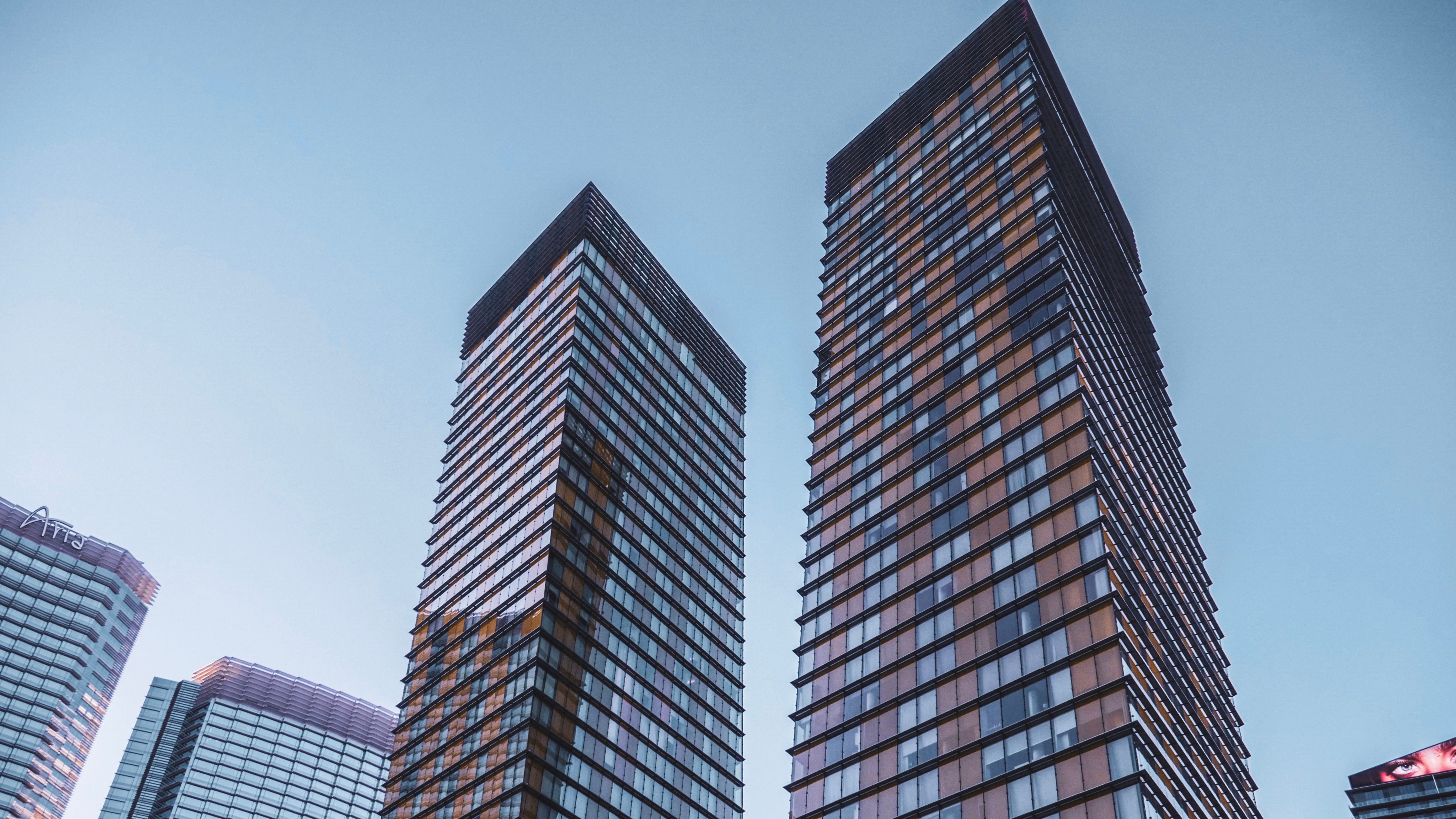 Grey High Rises Brown and Gray High-rise Buildings · Free Stock Photo