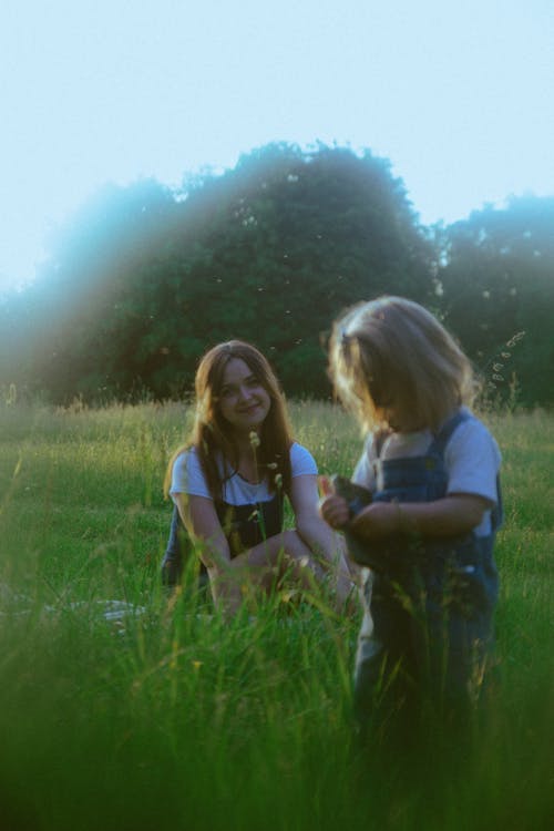 A woman and a child in a field