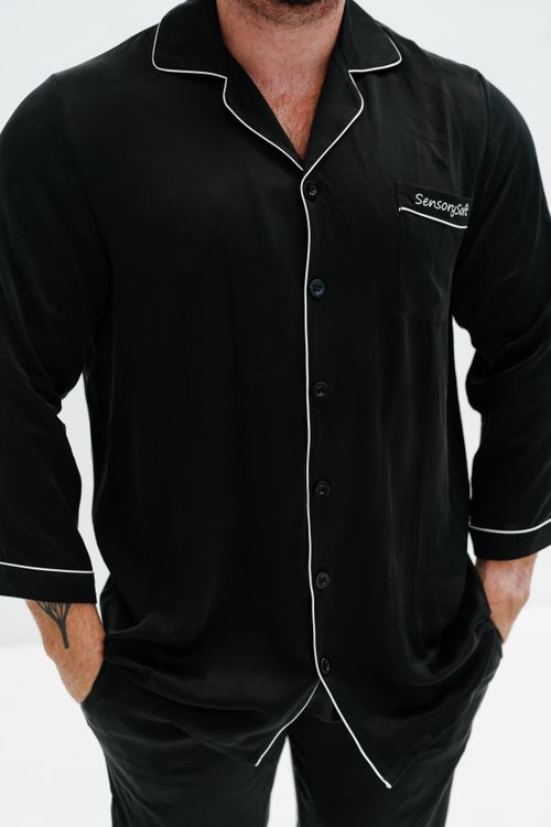 Free Stylish and comfortable black sleepwear for men featuring SensorSoft design. Stock Photo