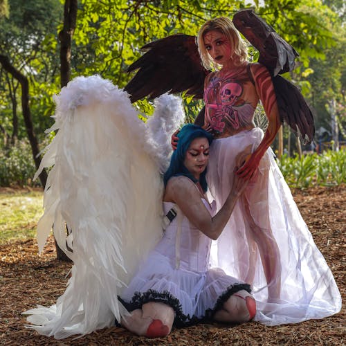 Two women dressed as angels