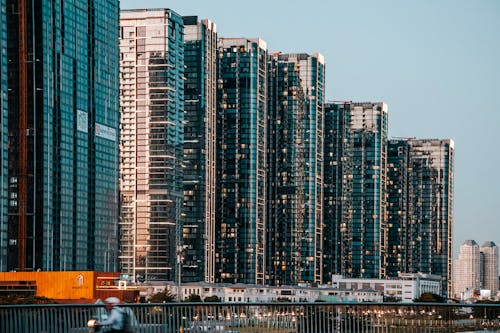 Foto profissional grátis de apartamentos, arranha-céus, cidade