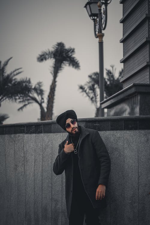 Man in Turban, Sunglasses and Black Coat