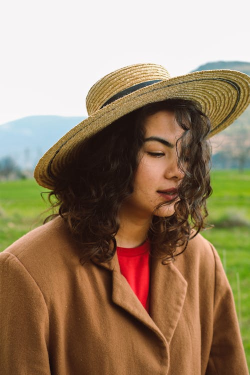 Brunette in Coat and Hat