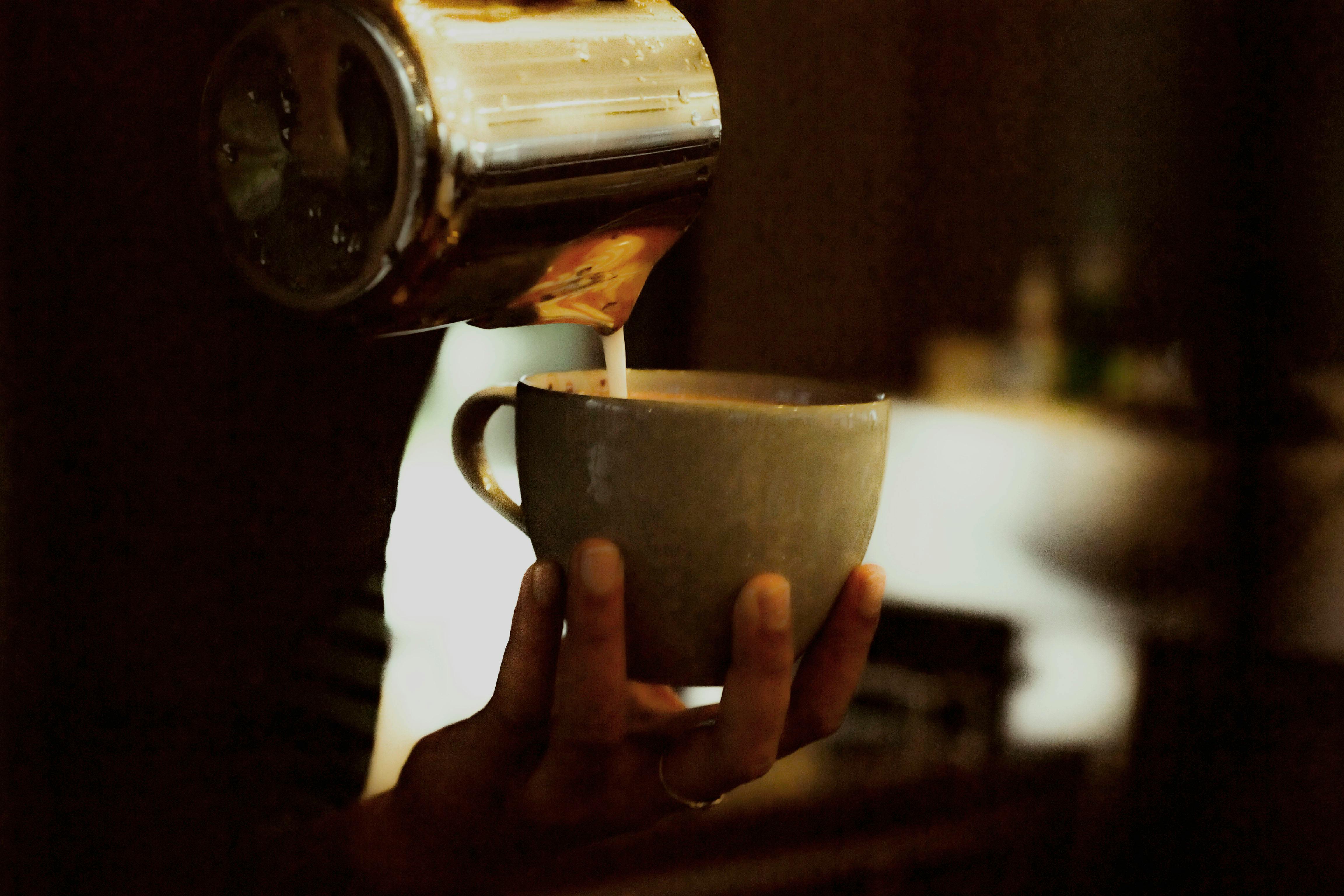 White ceramic mug on brown wooden coaster photo – Free Coffee cup Image on  Unsplash