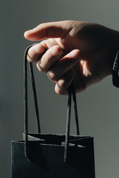 Hand with Gift Bag