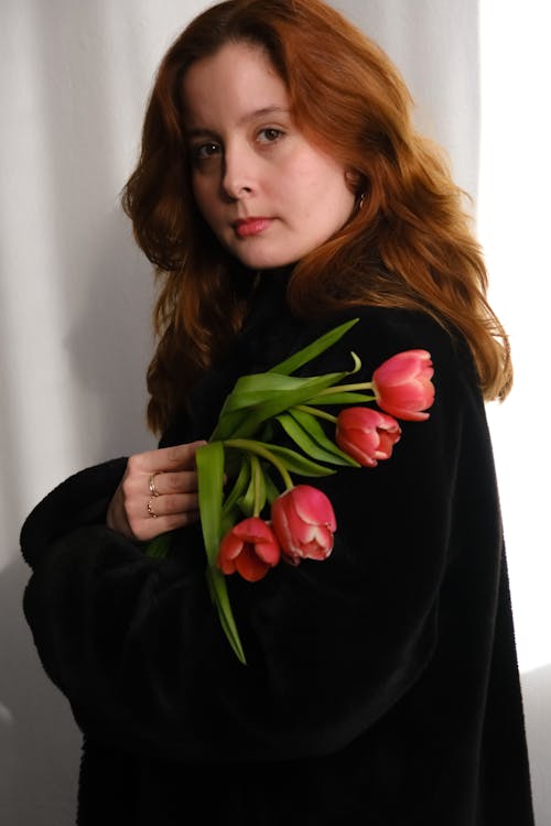 Portrait of Redhead Woman with Tulips