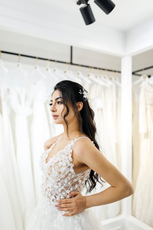 Young Woman Trying on a Wedding Dress 
