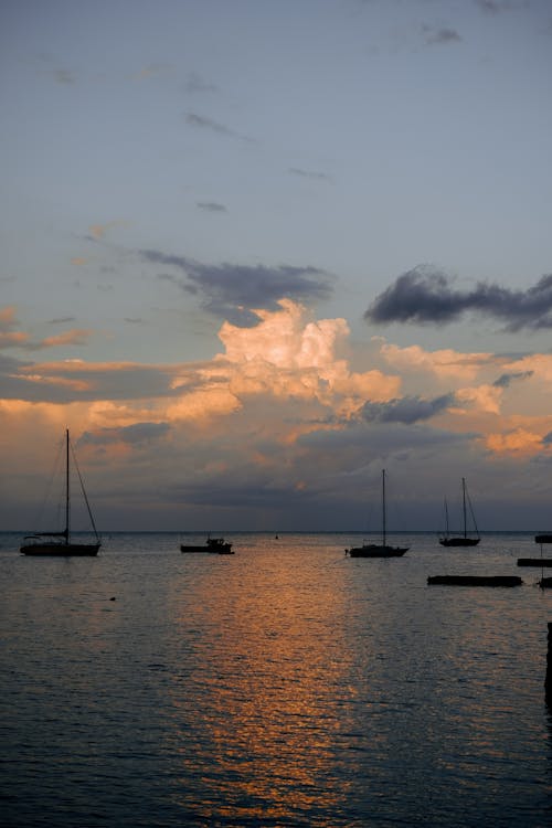 Photos gratuites de bateaux, ciel, coucher de soleil
