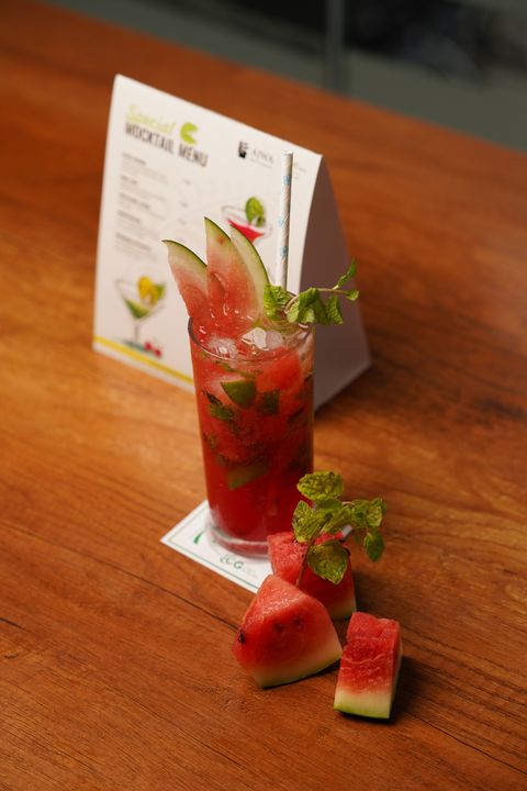 Mocktail Masterclass: 8 Café-Quality Drinks to Make at Home 4 Vibrant watermelon mocktail with fresh mint garnish on a light background