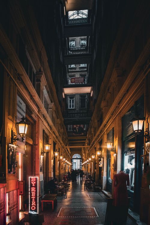 Free Dimly lit passageway filled with shops in Istanbul, creating a nostalgic, vibrant ambiance. Stock Photo